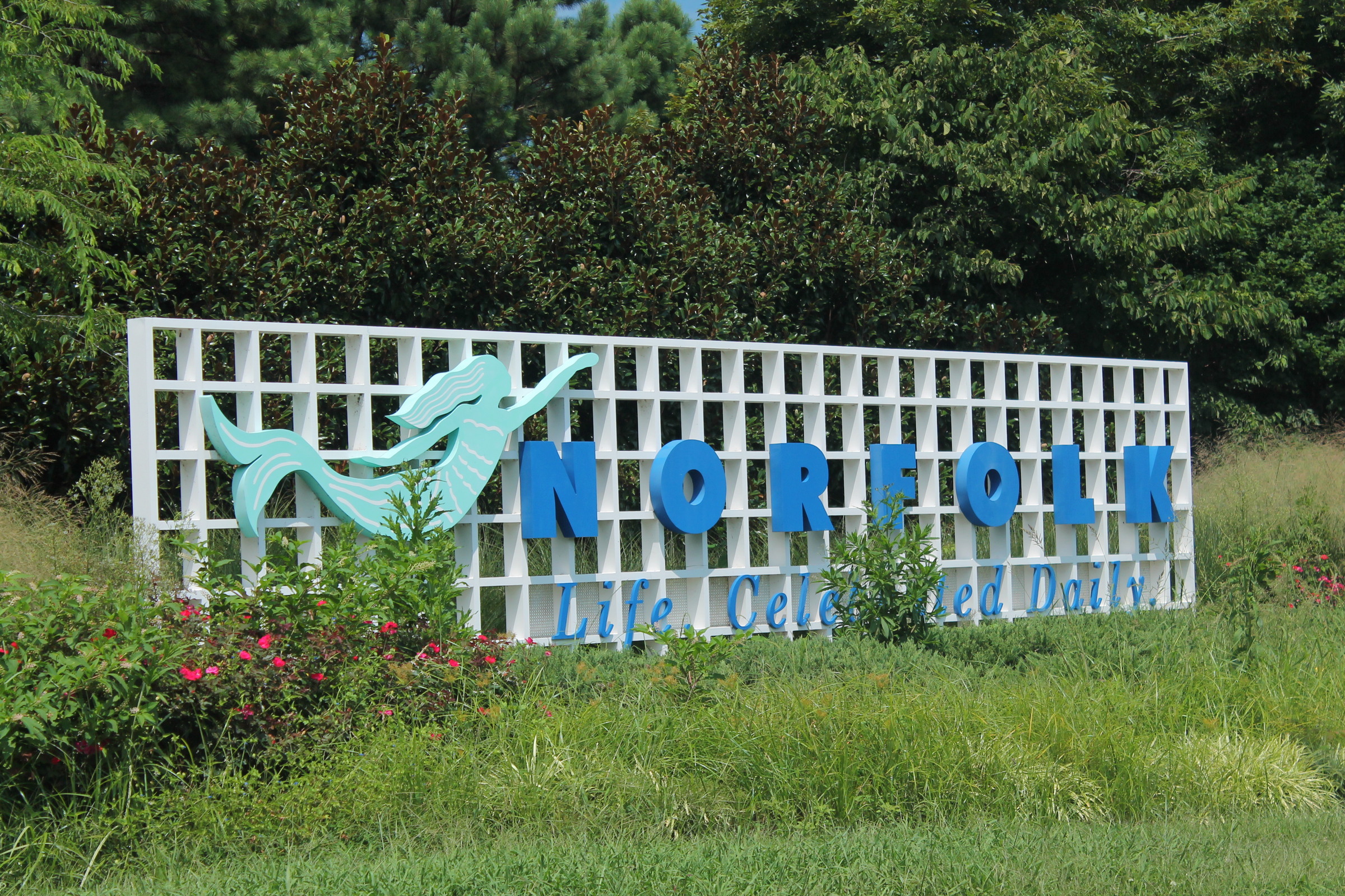 Strange Attractions 2 Norfolk welcome sign featuring a mermaid figure