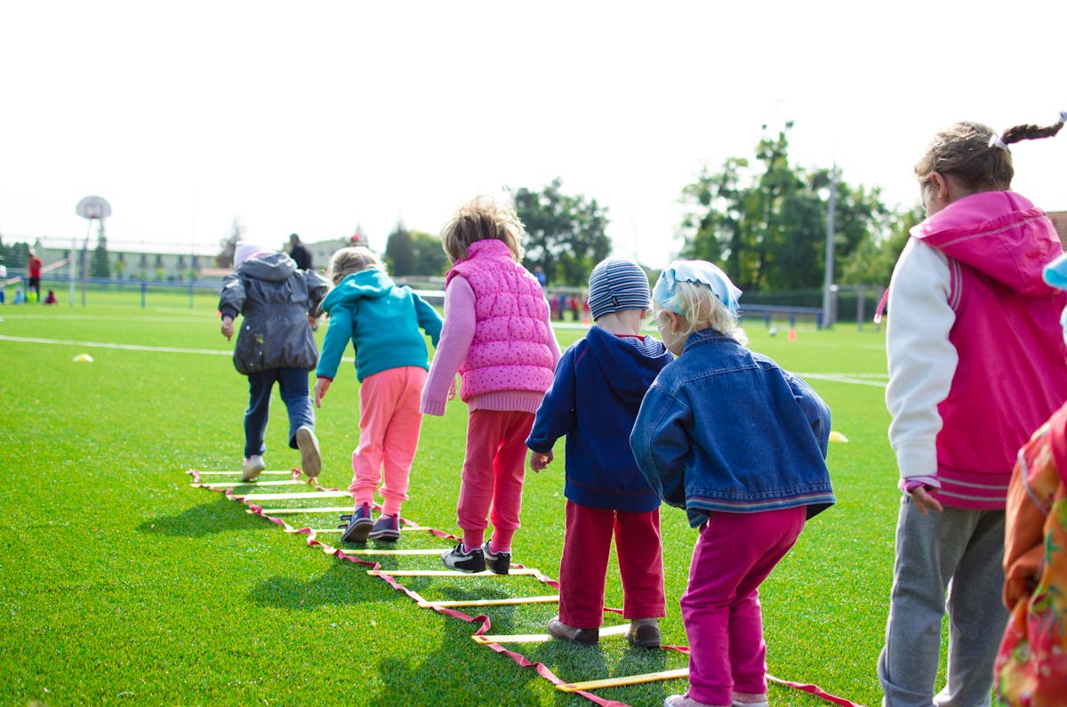 Children playing outdoors representing Norfolk cruise families and kids park stops